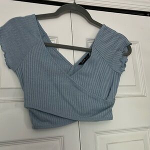 Light blue cropped shirt